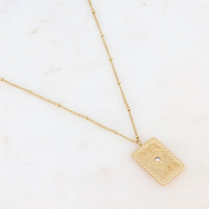 Collier doré avec une pampille rectangulaire ornée d'un cœur et d'un strass blanc 45+5 cm