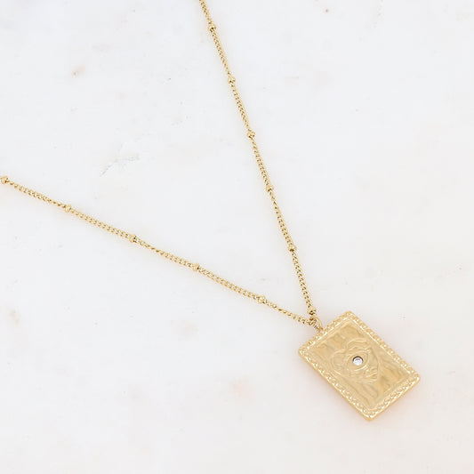 Collier doré avec une pampille rectangulaire ornée d'un cœur et d'un strass blanc 45+5 cm