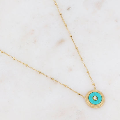 Collier avec une pampille ronde ornée d'une pierre howlite turquoise et d'un strass 39+7 cm
