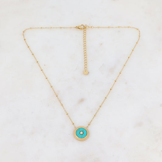 Collier avec une pampille ronde ornée d'une pierre howlite turquoise et d'un strass 39+7 cm