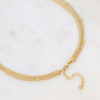 Collier triple rangs doré avec une pampille ronde ornée d'une nacre naturelle grise 38/50/60+5 cm