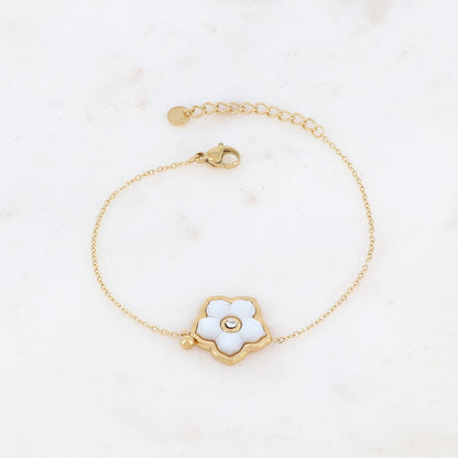 Bracelet avec une fleur nacrée et strassé