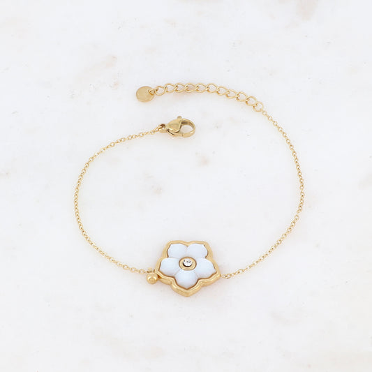 Bracelet avec une fleur nacrée et strassé