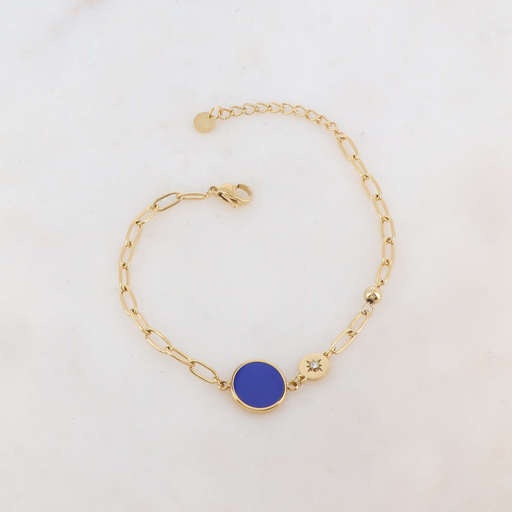 Bracelet en maille avec pièce ronde émaillée, strass, étoile et petite boule
