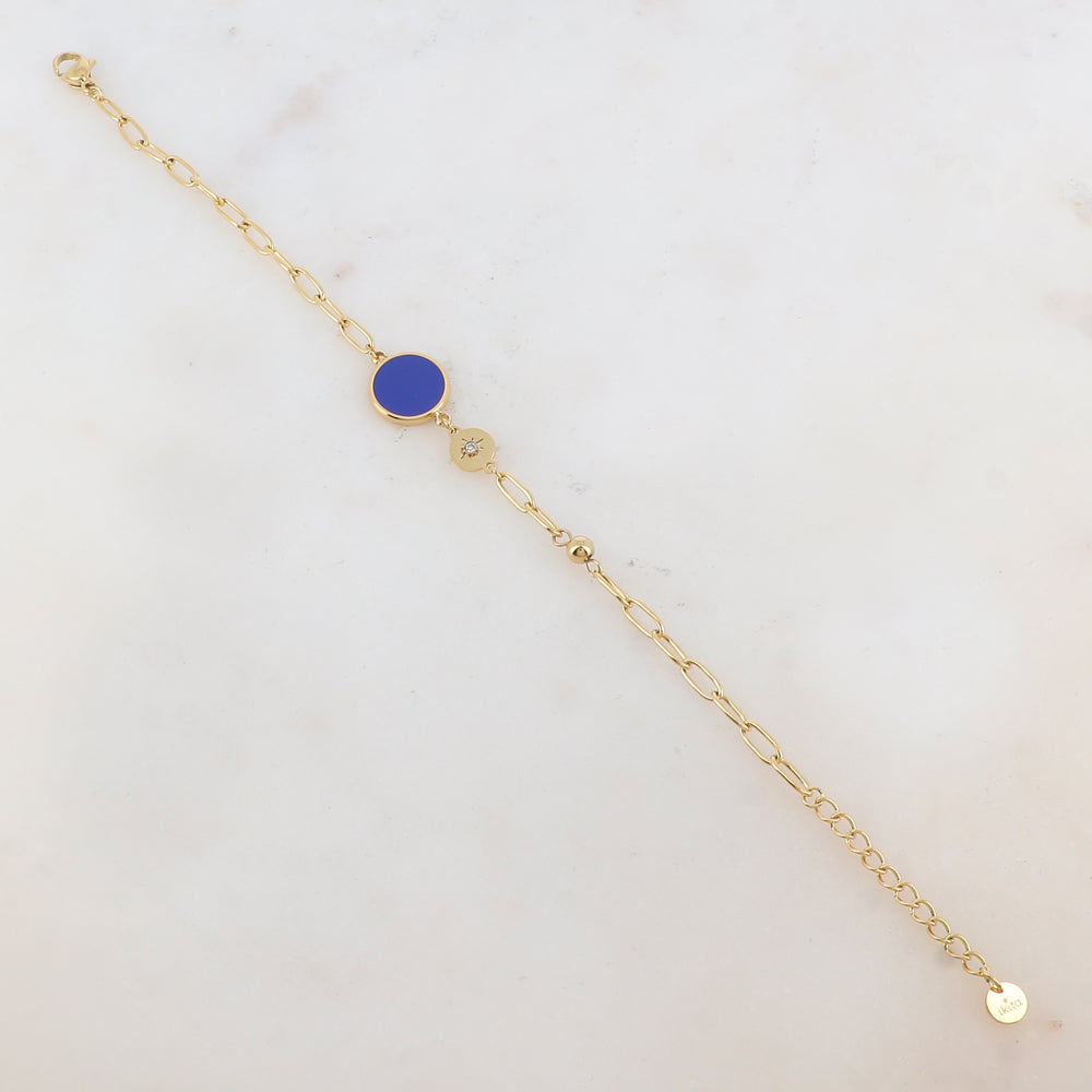 Bracelet en maille avec pièce ronde émaillée, strass, étoile et petite boule