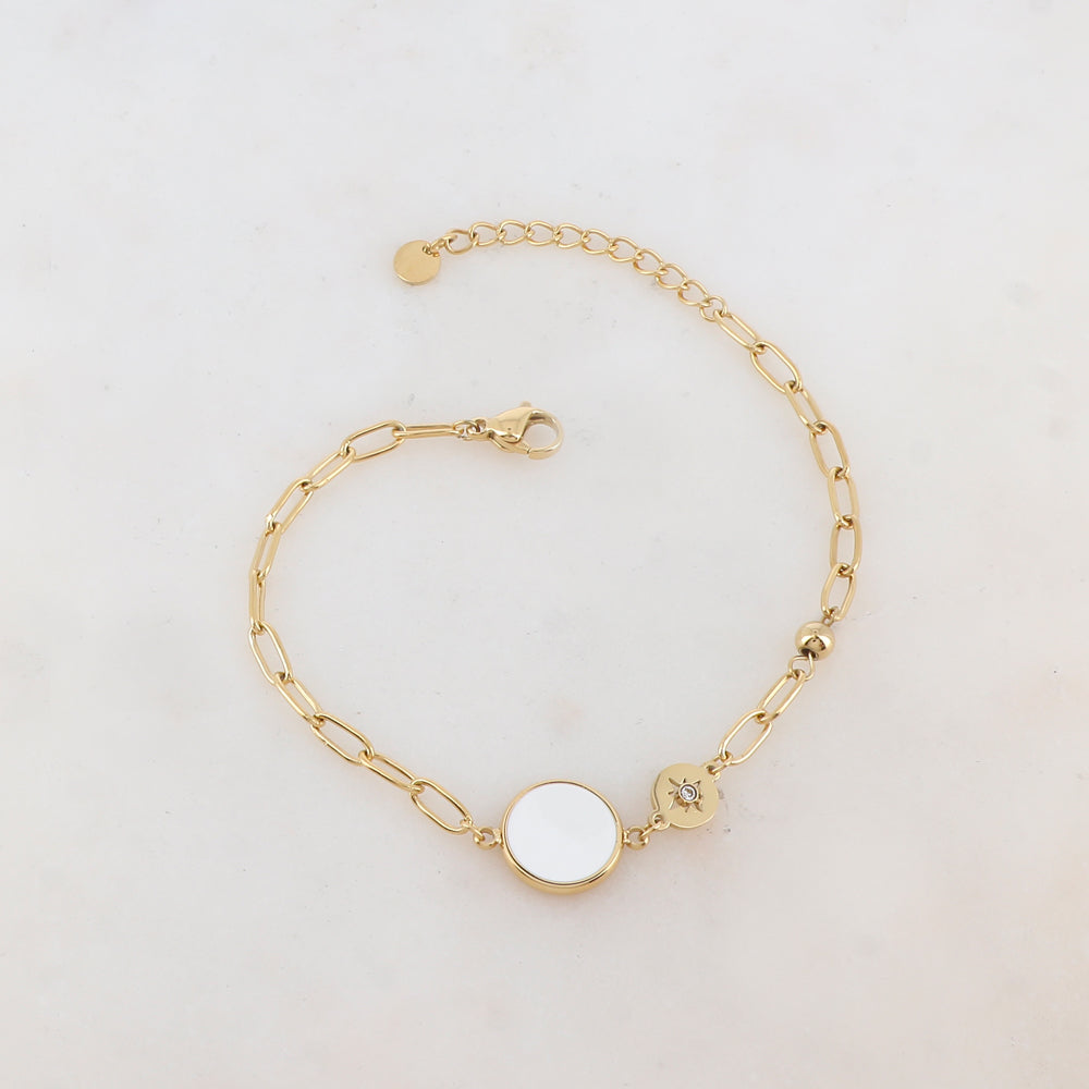 Bracelet en maille avec pièce ronde émaillée, strass, étoile et petite boule