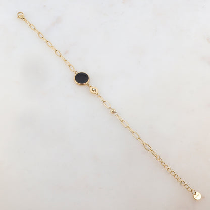Bracelet en maille avec pièce ronde émaillée, strass, étoile et petite boule