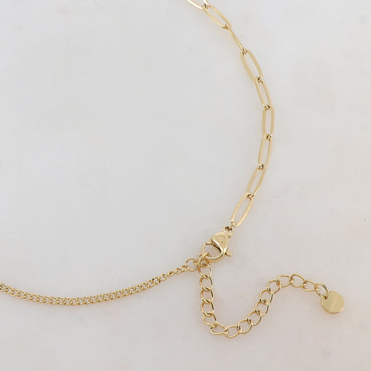 Collier en maille avec pendentif rond émaillé noir, strass, étoile et petite boule 40+5 cm