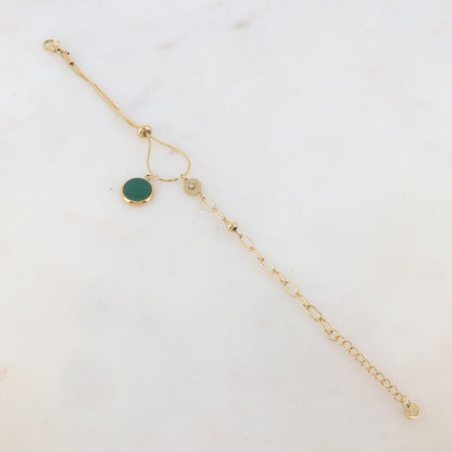 Bracelet en maille avec pièce ronde émaillée, strass, étoile, petite boule et rondelle