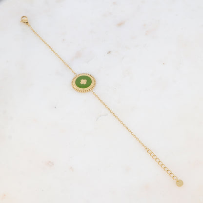 Bracelet avec pièce ronde émaillée, fleur gravée