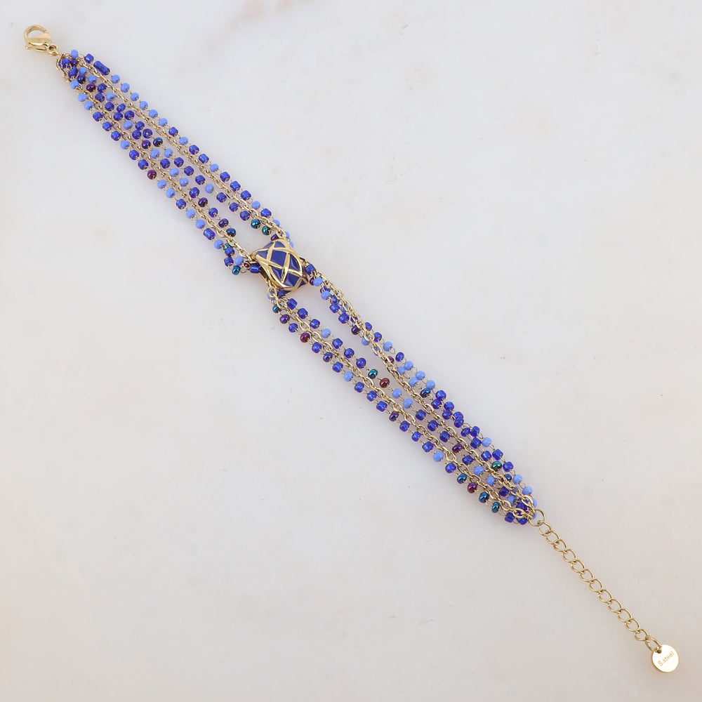 Bracelet trois rangs avec pâtes de verre et pièce émaillée style graphique