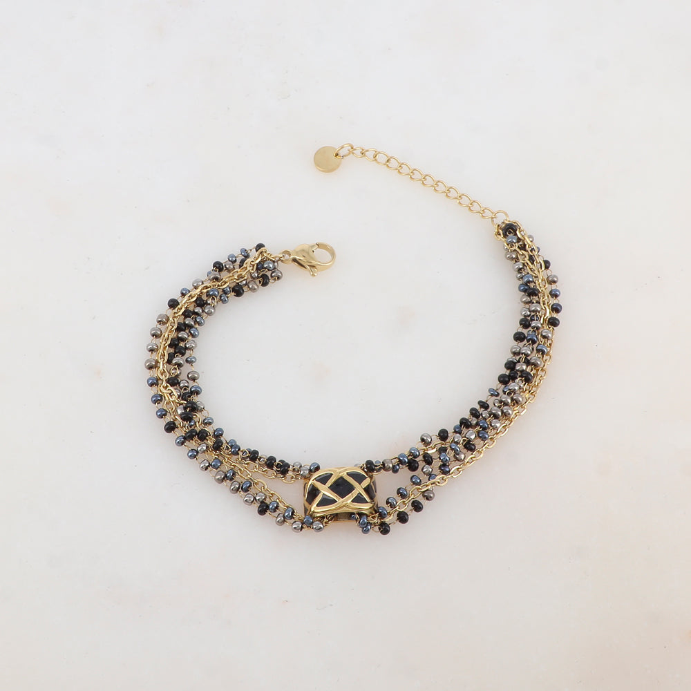 Bracelet trois rangs avec pâtes de verre et pièce émaillée style graphique