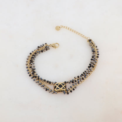 Bracelet trois rangs avec pâtes de verre et pièce émaillée style graphique