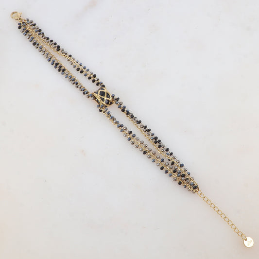 Bracelet trois rangs avec pâtes de verre et pièce émaillée style graphique