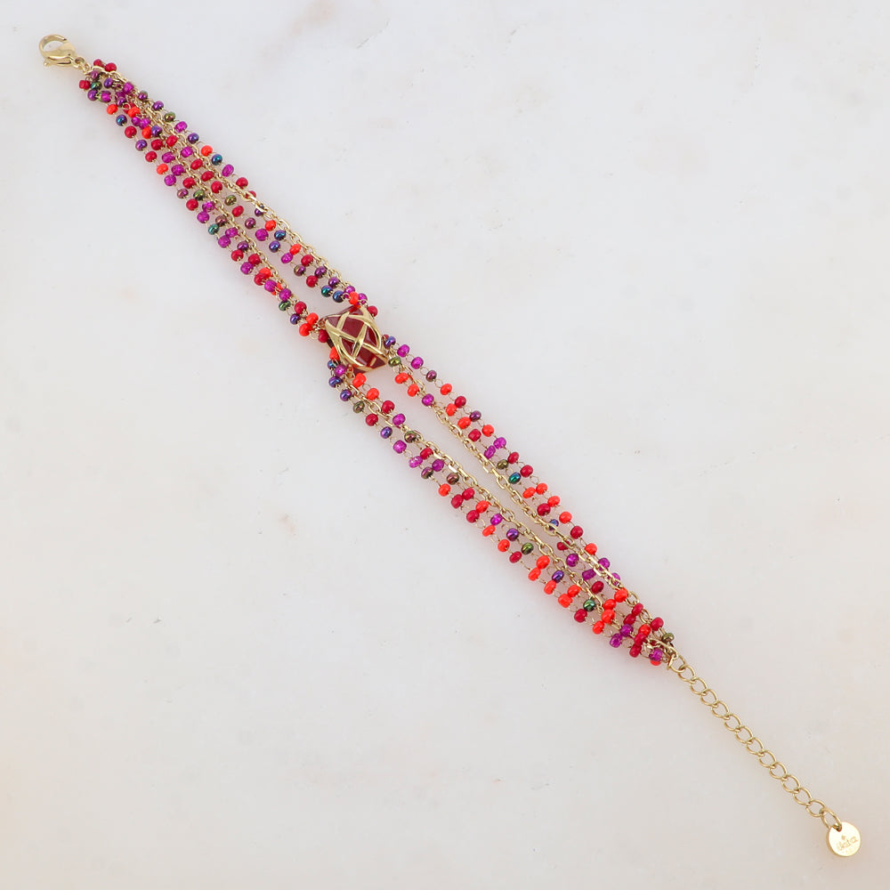 Bracelet trois rangs avec pâtes de verre et pièce émaillée style graphique