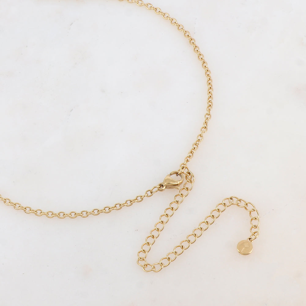 Collier avec pendentif rond ajouré de façon graphique (60+10CM)