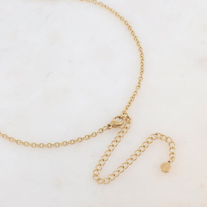 Collier avec pendentif rond ajouré de façon graphique (60+10CM)