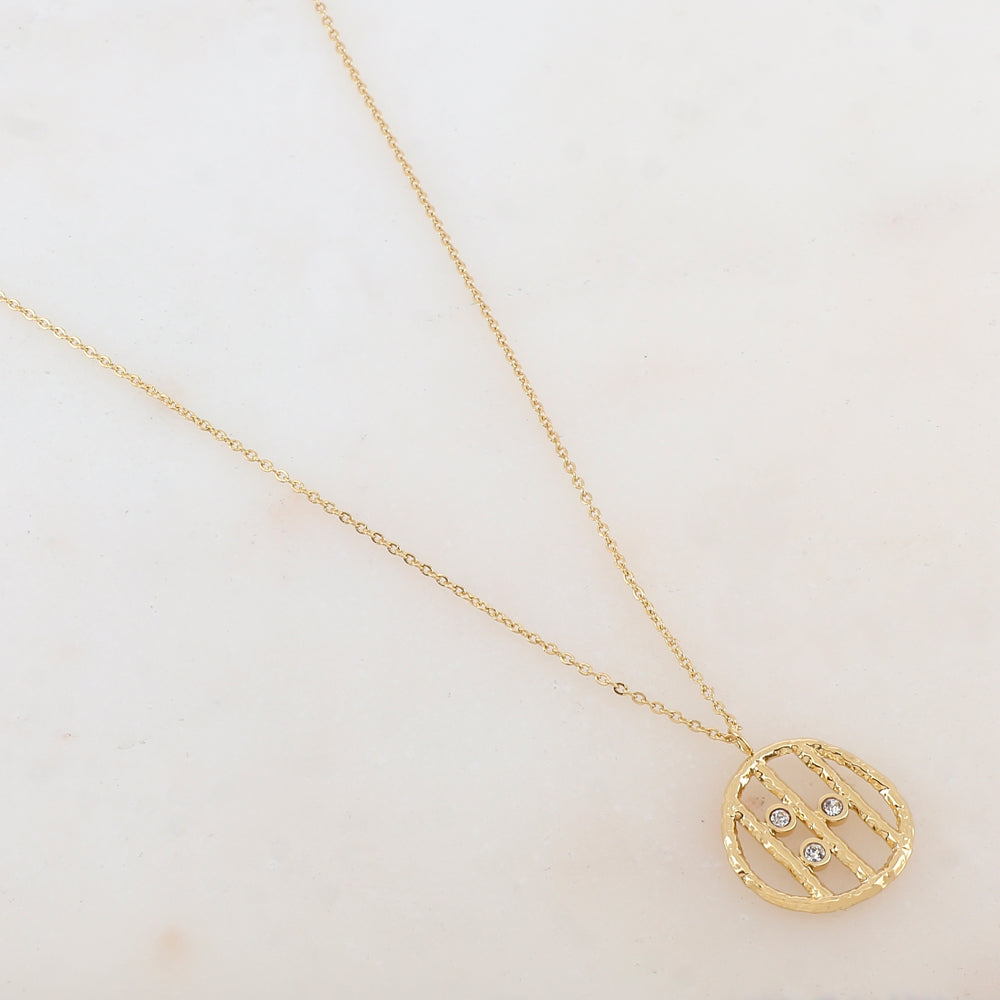 Collier doré avec pendentif rond et strass blancs 38+7 cm