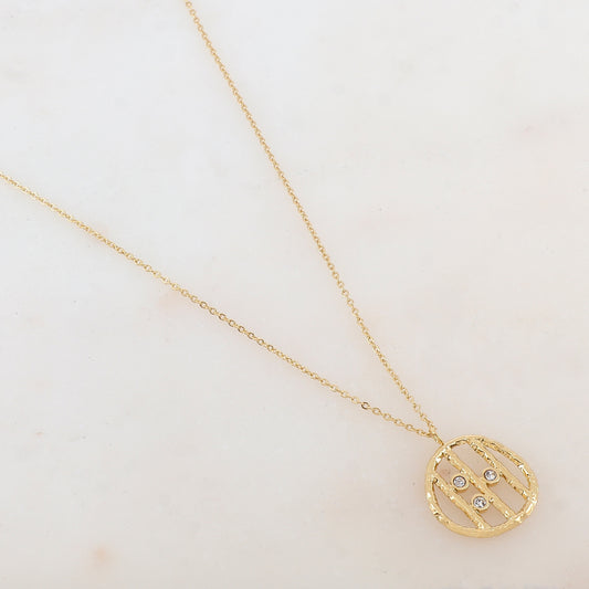 Collier doré avec pendentif rond et strass blancs 38+7 cm