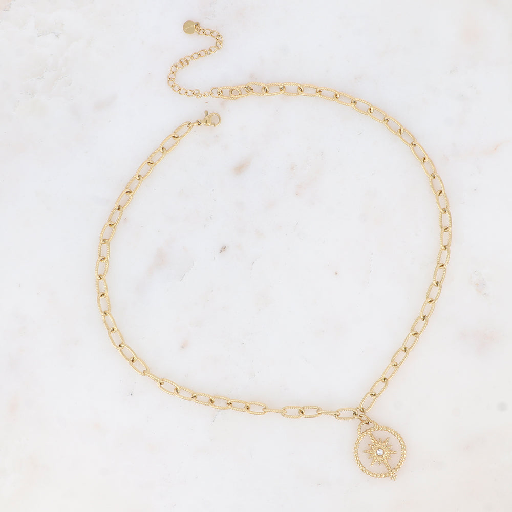 Collier doré avec un pendentif rond orné d'une étoile et d'un strass blanc 40+5 cm