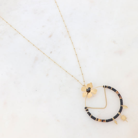 Sautoir avec un pendentif en forme d'anneau, petites rondelles, soleil, fleur