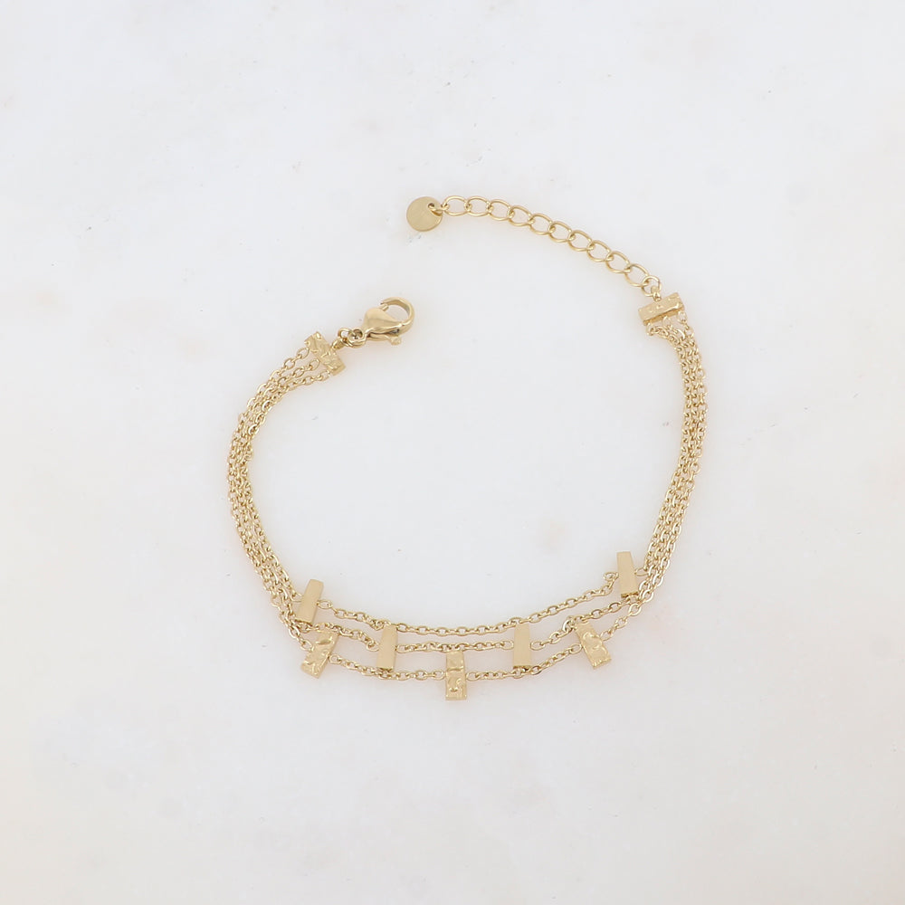 Bracelet trois rangs doré avec 7 barres : 3 martelées et 4 lisses