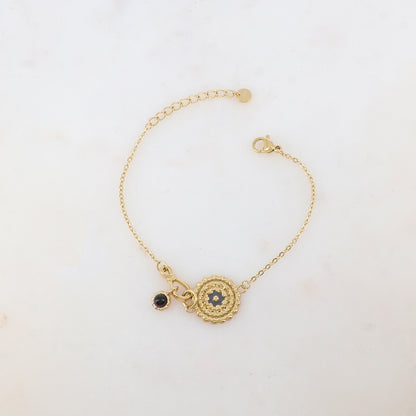 Bracelet avec pièce ronde émaillée avec motif fleur et pampille ornée de pierre naturelle