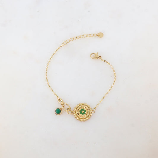 Bracelet avec pièce ronde émaillée avec motif fleur et pampille ornée de pierre naturelle
