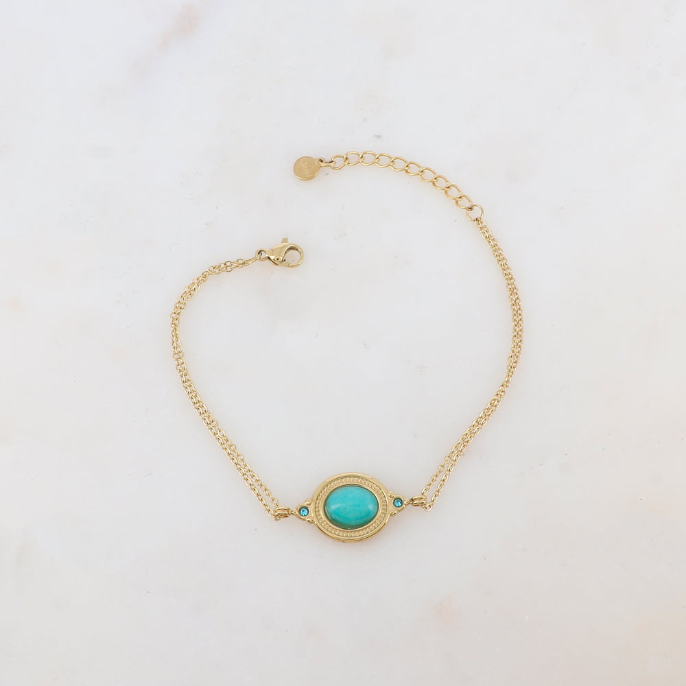 Bracelet deux rangs avec pièce ovale sertie de deux strass et d'une pierre naturelle