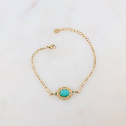 Bracelet deux rangs avec pièce ovale sertie de deux strass et d'une pierre naturelle