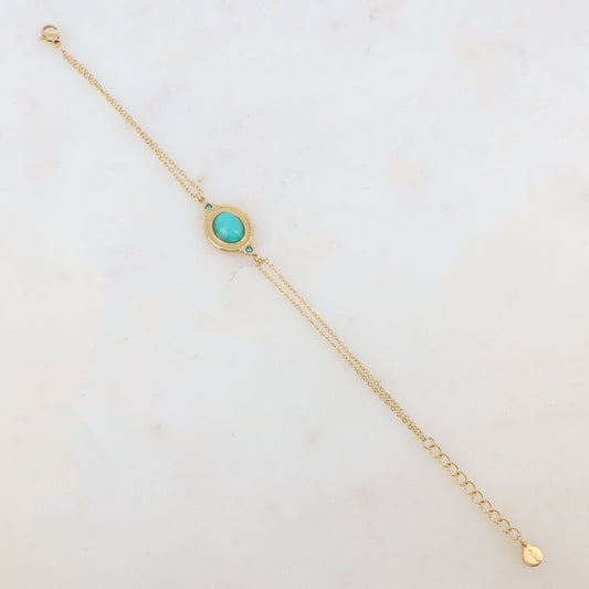 Bracelet deux rangs avec pièce ovale sertie de deux strass et d'une pierre naturelle
