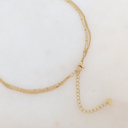 Collier trois rangs avec 2 pendentifs fleurs émaillées et strass (39/44/54+7CM)