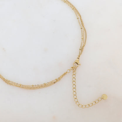 Collier trois rangs avec 2 pendentifs fleurs émaillées et strass (39/44/54+7CM)