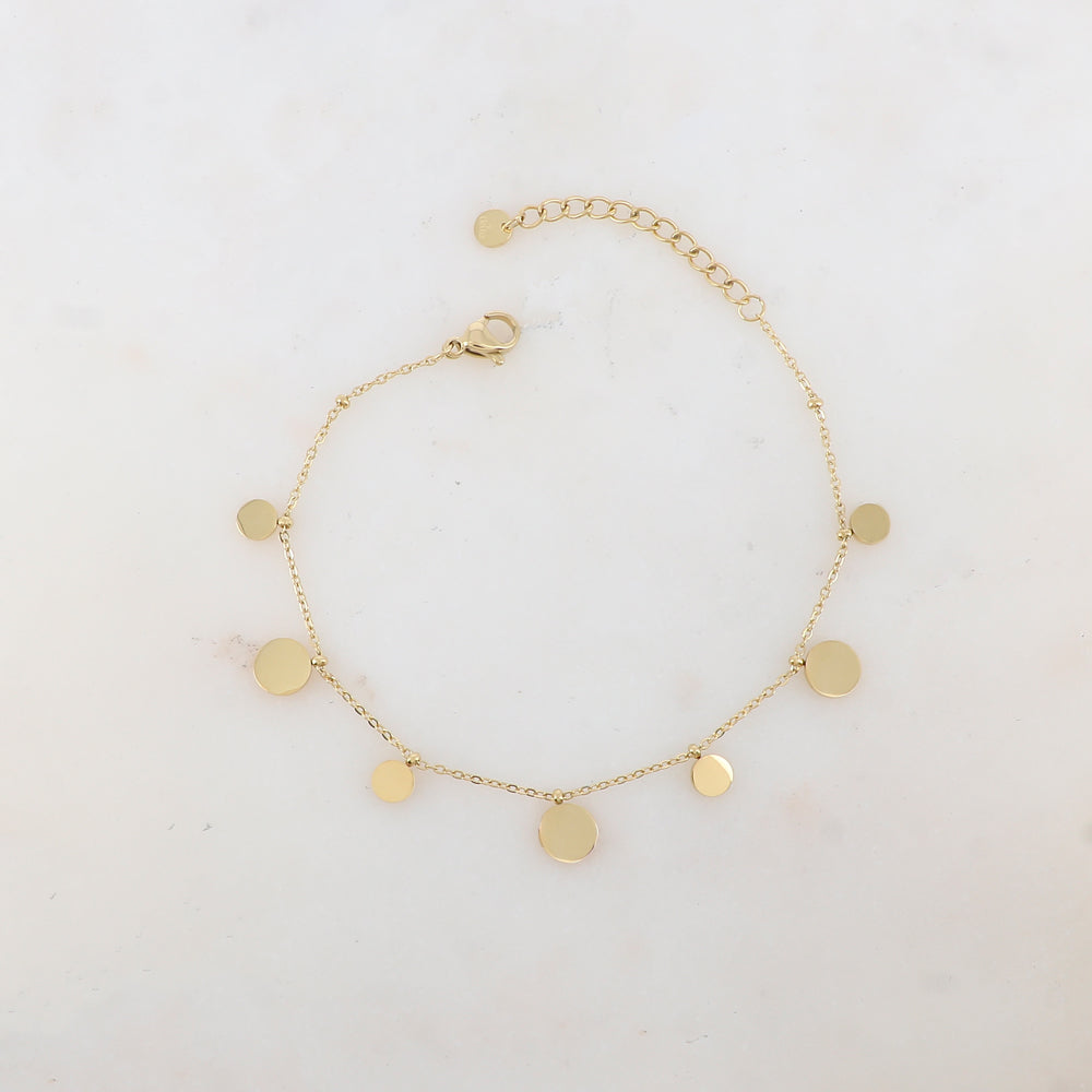 Bracelet avec pampilles rondes