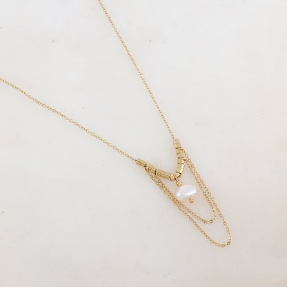 Collier avec chaînes tombantes, petites rondelles et perle d'eau douce (40+5CM)