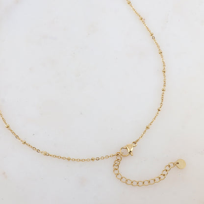 Sautoir avec pendentif plume (60+5CM)