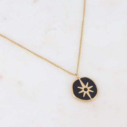 Collier sur chaîne doré composé d'un pendentif étoile émaillé noir serti d'un strass noir 38+8 cm