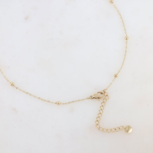 Sautoir avec pendentif rond martelé, 2 strass, 7 perles en résine imitation perle d'eau douce (85+5CM)