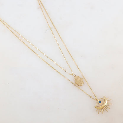 Collier double rangs doré avec deux pendentifs forme œil (40/44+5CM)