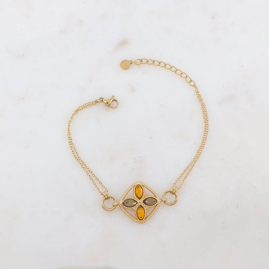 Bracelet avec deux anneaux ronds, un anneau carré et quatre pâtes de verre ovales