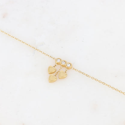 Bracelet avec chaînes, cœurs et strass