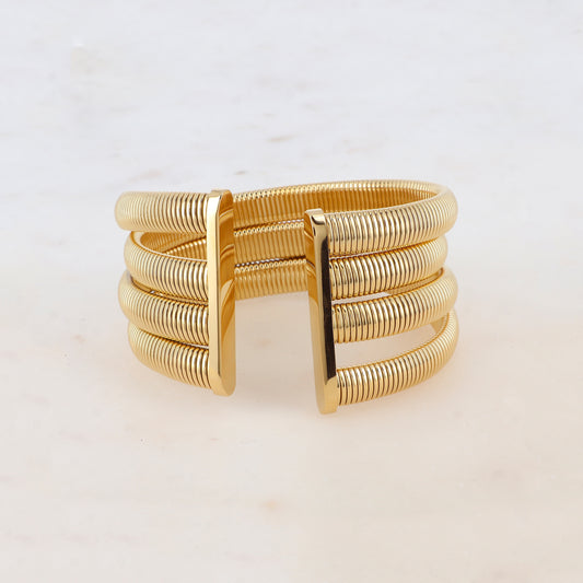 Manchette 4 rangs style croisé avec petites boules et pierres naturelles ovales et rondes