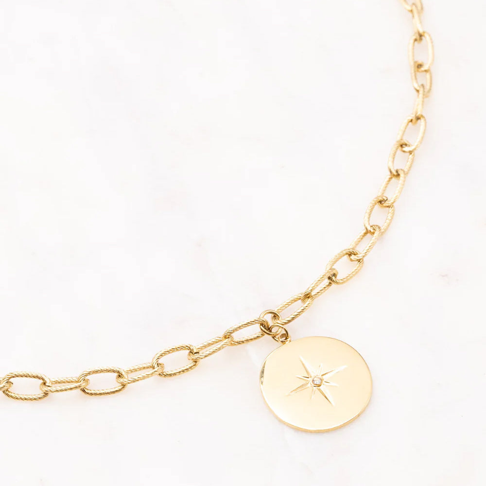 Collier en maille texturés avec pampille étoilée et strass