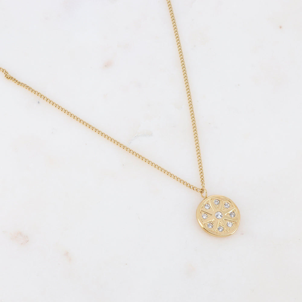 Collier sur chaîne composé d'un pendant rond avec un motif étoile orné de strass blancs 38+7 cm