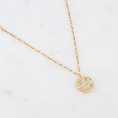 Collier sur chaîne composé d'un pendant rond avec un motif étoile orné de strass blancs 38+7 cm