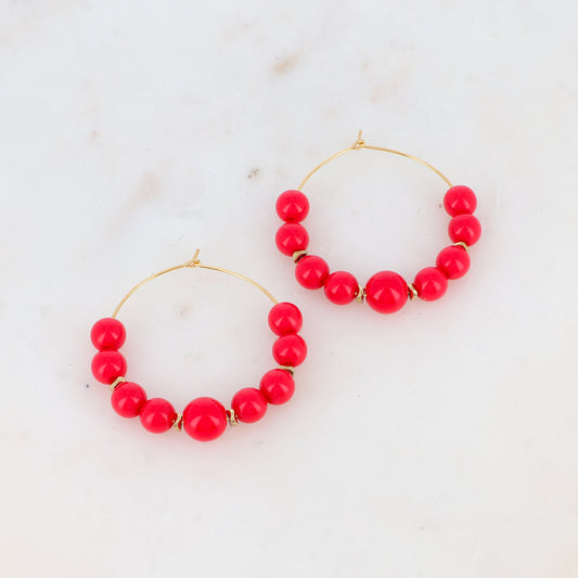 Créoles avec 9 perles en résine Diamètre : 4,5 cm.
