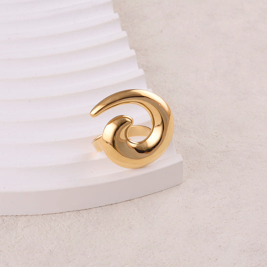 Bague avec pièce forme spirale, effet lisse