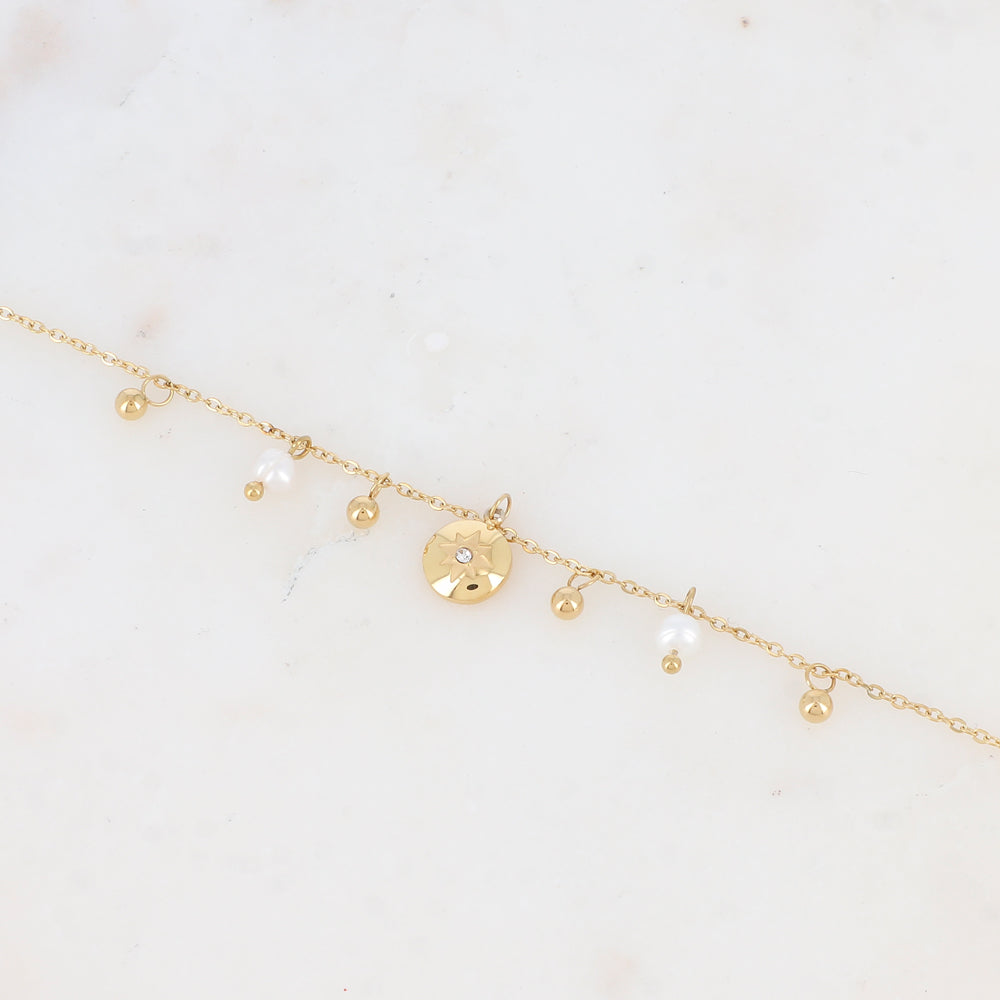 Bracelet avec pampilles boules et ronde avec motif étoile strassé et perle d'eau douce