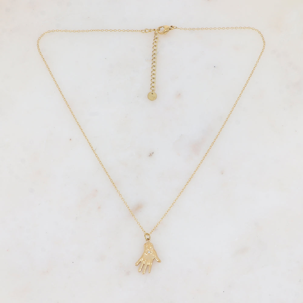 Collier avec pampille forme main orné d'un œil strassé