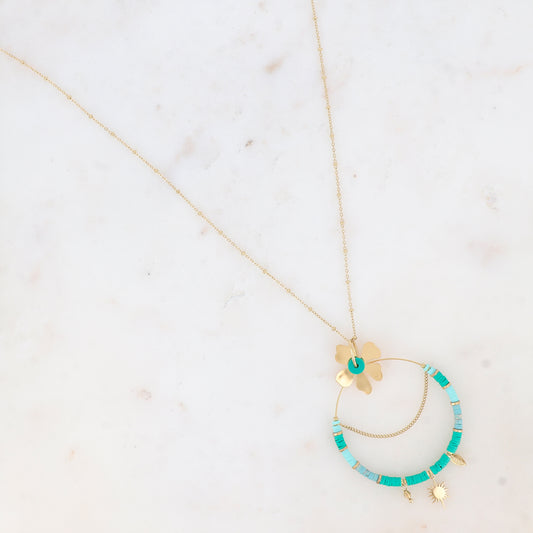 Sautoir avec un pendentif en forme d'anneau, petites rondelles, soleil, fleur